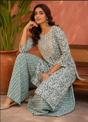 Sea green floral straight kurti with gold sequin yoke and pant set