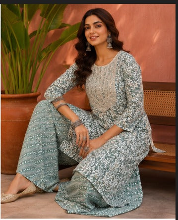 Sea green floral straight kurti with gold sequin yoke and pant set