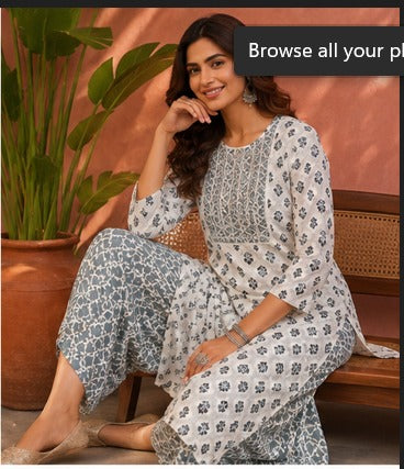 White floral V-neck tassel kurti with striped pant set