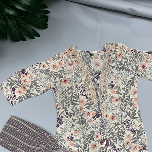 Ivory floral block-print straight kurti with sequin yoke and pant set
